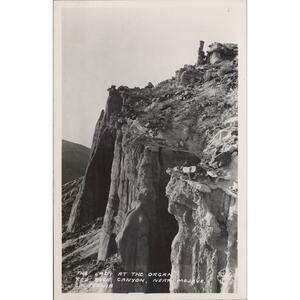 RPPC The Lady At The Organ Red Rock Canyon Mojave California Postcard